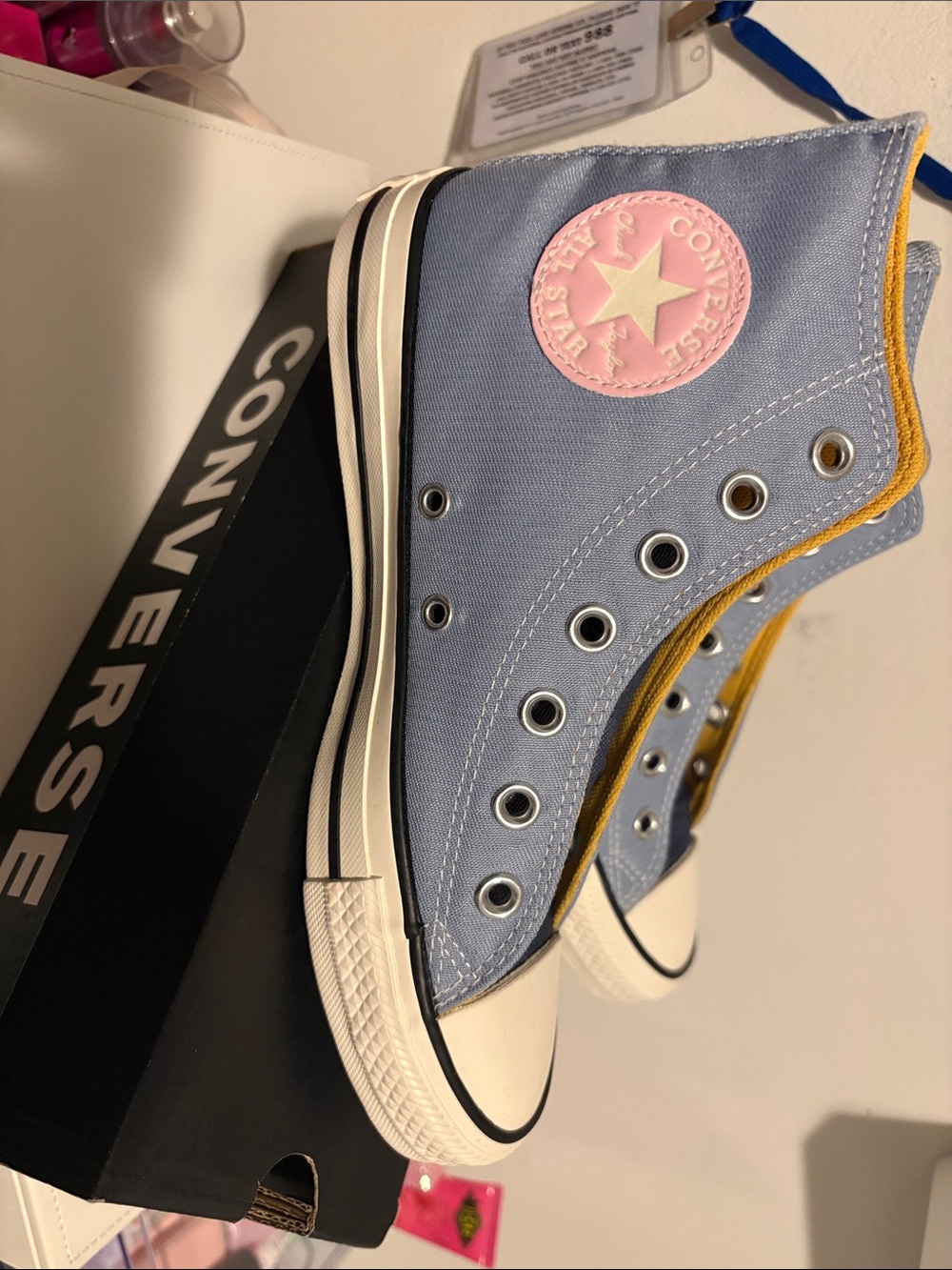 Converse woman’s High Top Sneakers in Light Blue with Pink Patch and Yellow Trim